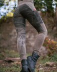 Camouflage jogger pants in black and gray with red side logo patch—outdoor street style