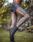 Limited Edition Sprinter Shorts by crossfox in black fabric with orange trim, unisex fit for extra small to large