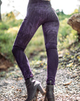 Limited Edition Fleece Lucien Pocket Leggings by Crossfox in deep purple with front pockets in outdoor light
