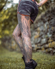 Limited Edition Sprinter Shorts crossfox unisex shorts black with brown trim and fabric texture outdoors