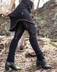 Unbranded lace-up black leather ankle boots with block heel and visible red trim detail outdoors
