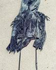 Distressed navy denim jacket with hood and fringe hem, tasseled drawstrings and metal eyelets